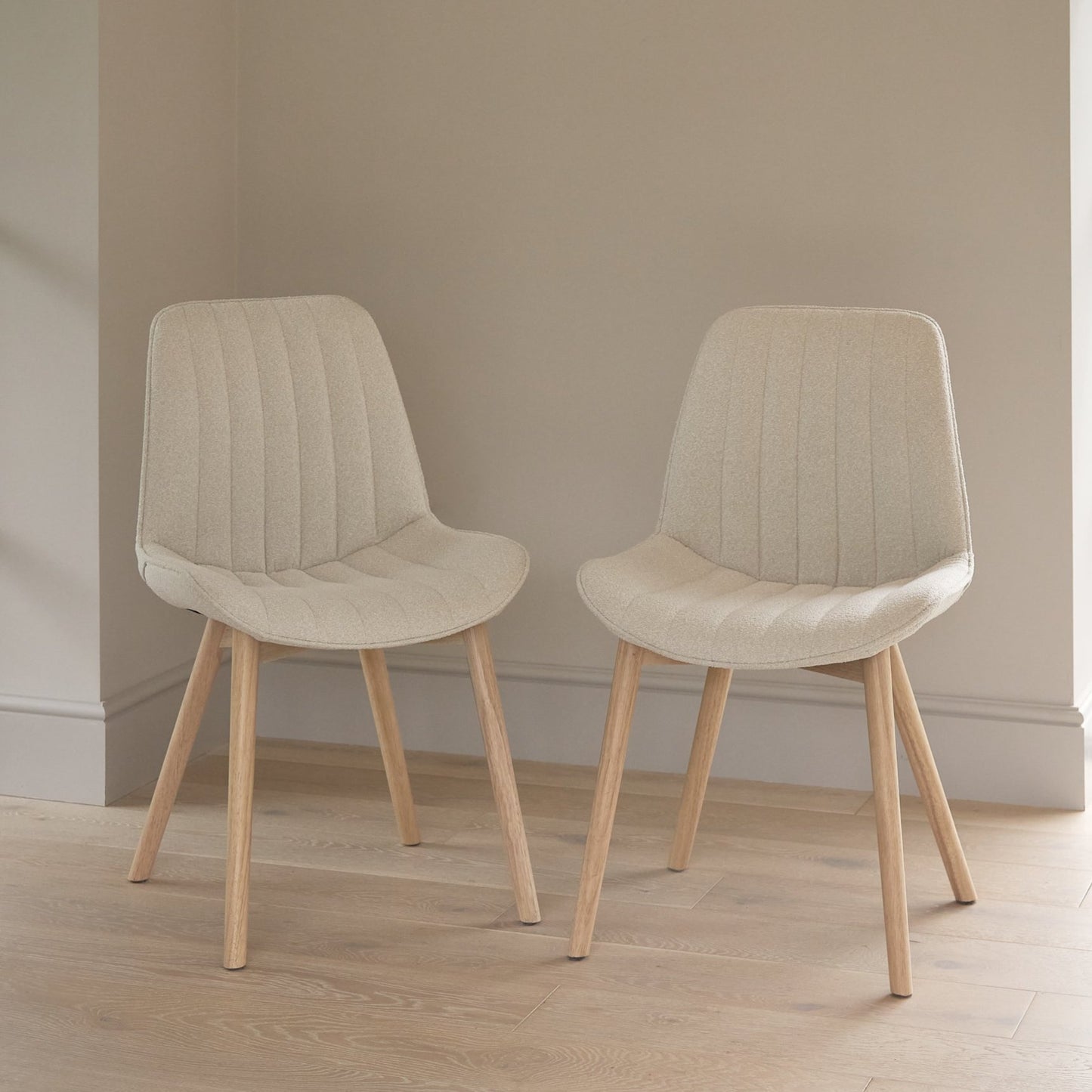 amelia-whitewash-extending-dining-set-bella-boucle-dining-chairs