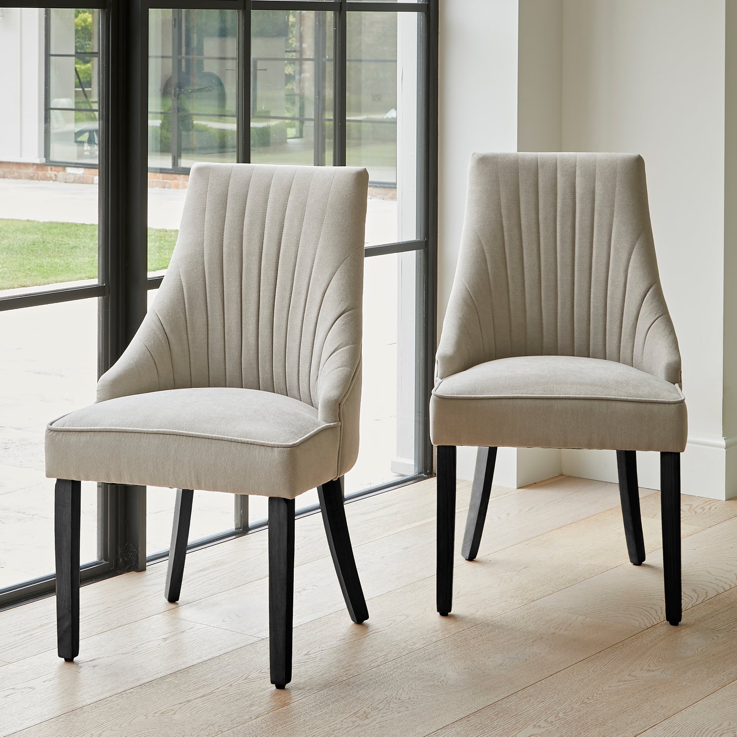 Nadine soft beige dining chairs laura james
