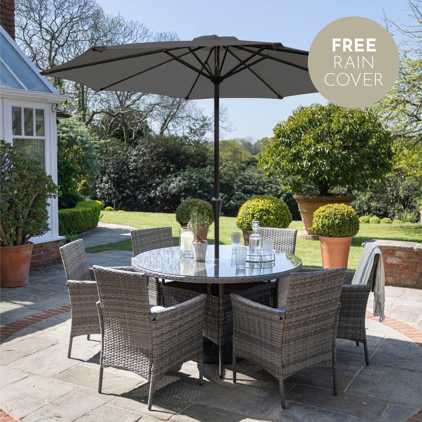 Kemble Grey 6 Seater Outdoor Round Dining Set with Grey Parasol - Laura James