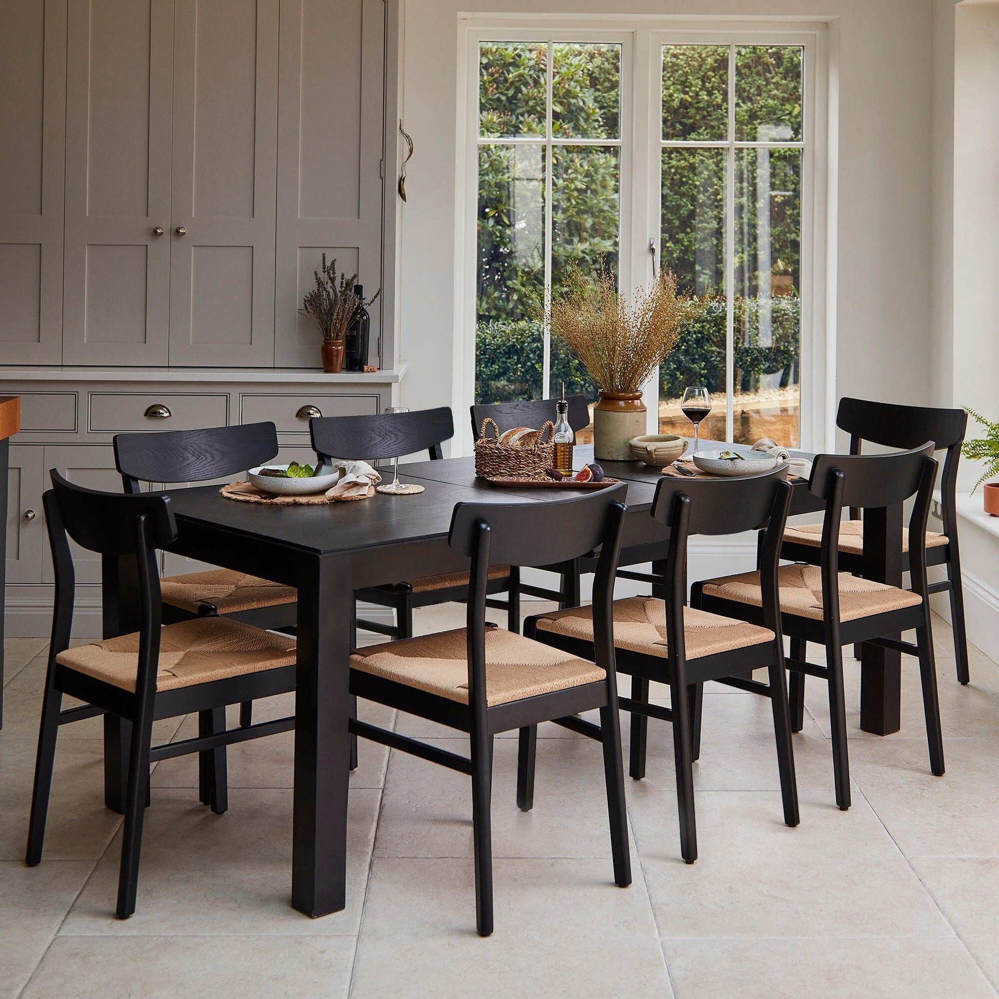 Magnus Black Extendable Dining Set with Woven Chairs - Laura James