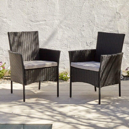 Marston 4 Seater Rattan Outdoor Dining Set with Cream Parasol - Rattan Garden Furniture - Black - Polywood Top - Laura James