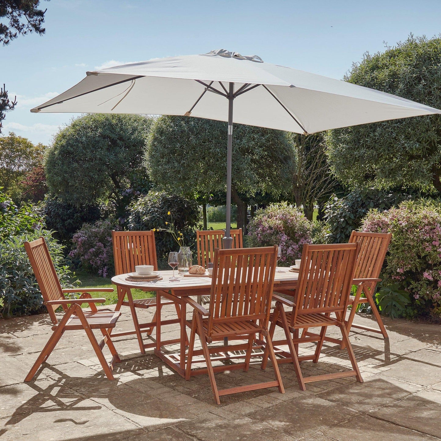 Oakley 6 Seater Wooden Extendable Garden Dining Set with Cream Parasol - Laura James
