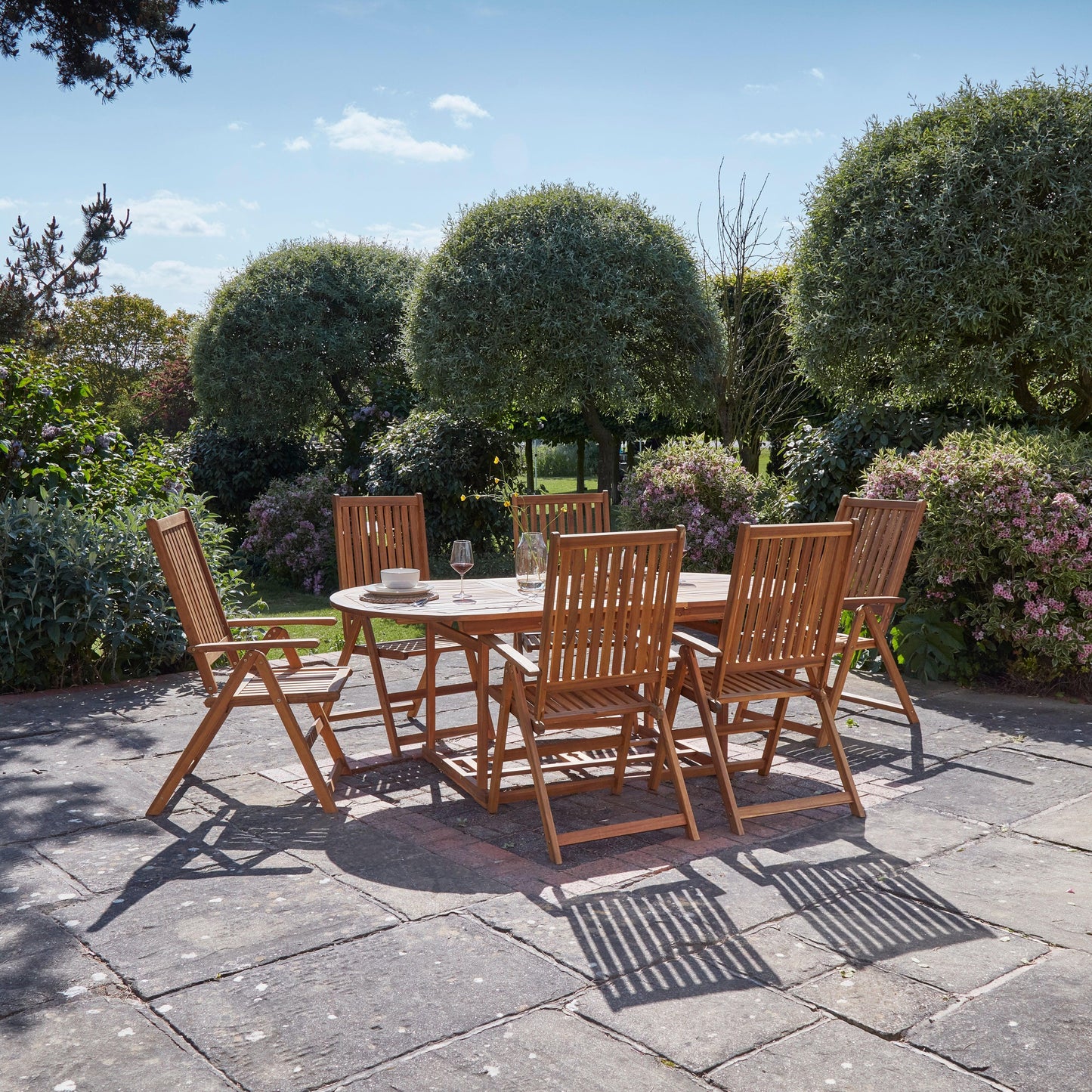 Oakley 6 Seater Wooden Extendable Garden Dining Set with Grey Parasol