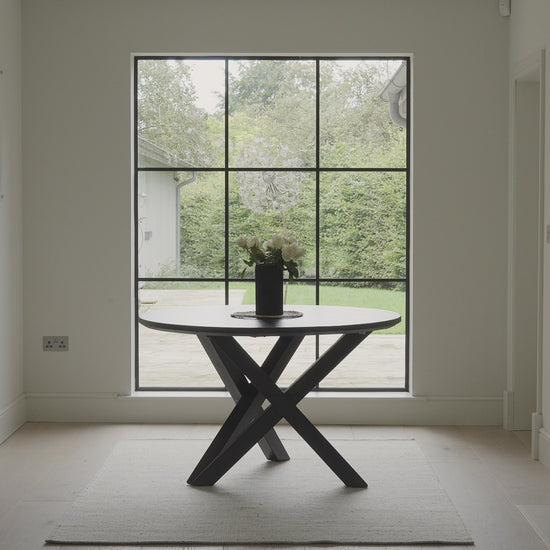 levi-black-round-dining-table-video