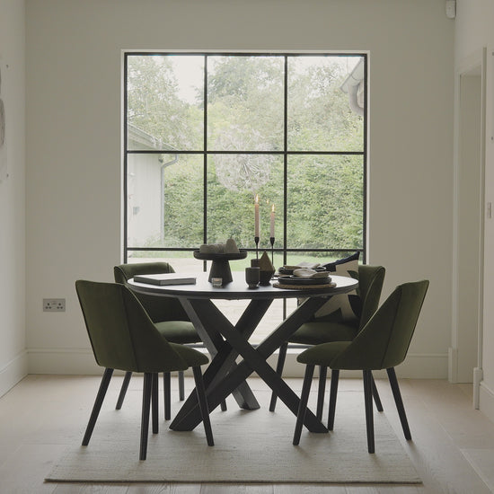 levi-black-round-dining-table-freya-fern-green-dining-chair-video